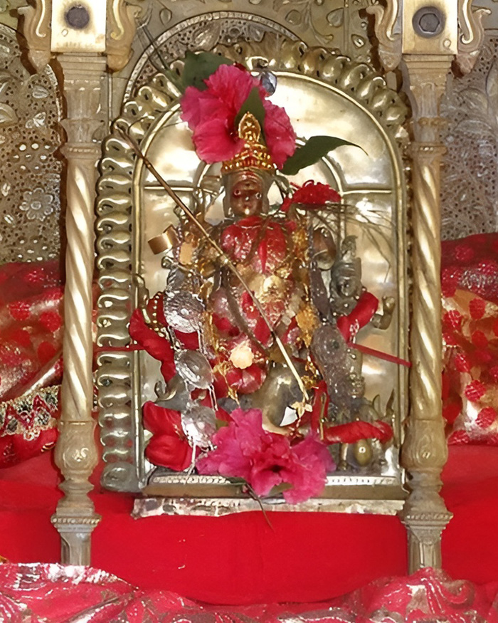 Maa Durga idol adorned with hibiscus flowers